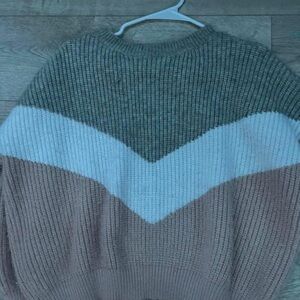 Small Sweater, worn but in good condition.